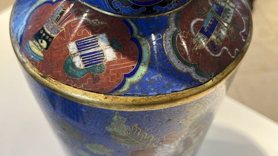 A Chinese famille verte powder-blue-ground vase and a cloisonn&eacute; rouleau vase, 19th C.