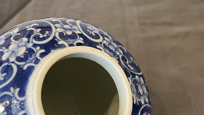 A pair of Chinese Canton famille rose vases and a pair of blue and white covered jars, 19th C.