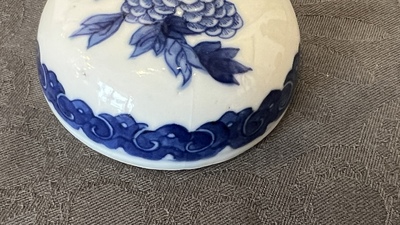 A pair of Chinese Canton famille rose vases and a pair of blue and white covered jars, 19th C.