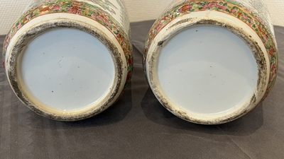 A pair of Chinese Canton famille rose vases and a pair of blue and white covered jars, 19th C.
