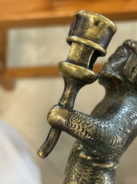 A rare bronze 'wild man' candlestick, Flanders or Germany, 15/16th C.