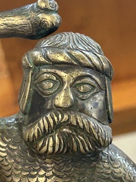 A rare bronze 'wild man' candlestick, Flanders or Germany, 15/16th C.