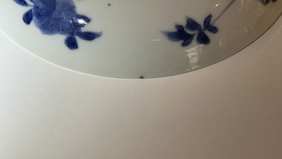A pair of Chinese blue and white cups and saucers, Chenghua mark, Kangxi