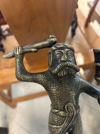 A rare bronze 'wild man' candlestick, Flanders or Germany, 15/16th C.