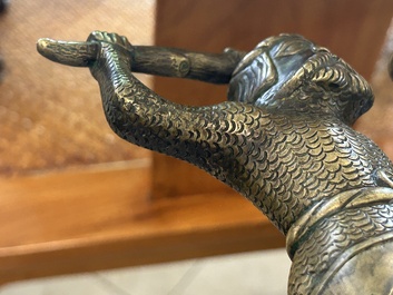 A rare bronze 'wild man' candlestick, Flanders or Germany, 15/16th C.