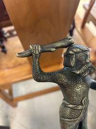 A rare bronze 'wild man' candlestick, Flanders or Germany, 15/16th C.