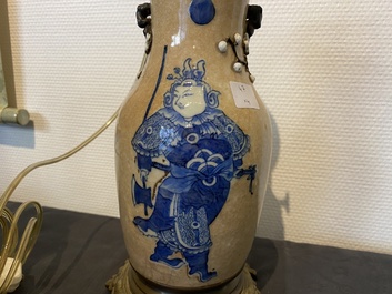 A Chinese blue and white celadon-ground vase, a pair of Nanking vases and a famille verte fish bowl, 19th C.