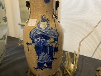 A Chinese blue and white celadon-ground vase, a pair of Nanking vases and a famille verte fish bowl, 19th C.