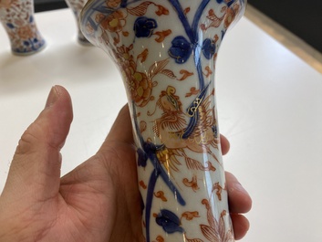 A Chinese grisaille garniture of five 'phoenix' vases, Kangxi/Yongzheng