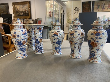 A Chinese Imari-style garniture of six vases with floral design, Kangxi