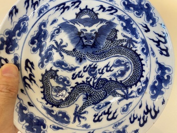 A Chinese blue and white dish and ten plates, 19th C.