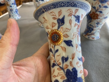 A Chinese Imari-style garniture of six vases with floral design, Kangxi