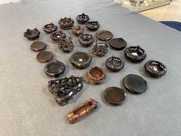 71 Chinese well-carved wooden stands, 19/20th C.