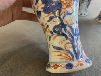 A Chinese Imari-style garniture of six vases with floral design, Kangxi