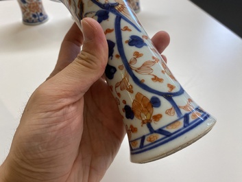 A Chinese grisaille garniture of five 'phoenix' vases, Kangxi/Yongzheng