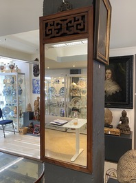 A Chinese wooden mirror and a foldable stool, 19/20th C.