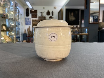 A Chinese cream-glazed jar and cover, Northern Song