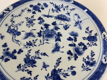 A Chinese blue and white dish and ten plates, 19th C.