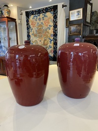 A pair of Chinese sang-de-boeuf-glazed covered jars, 19th C.