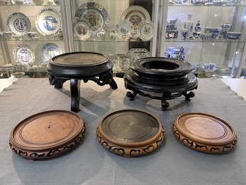 A varied collection of Chinese wooden stands, 19/20th C.