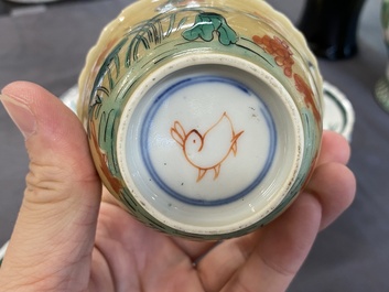 Three Chinese Kangxi-style caf&eacute;-au-lait-ground famille verte cups and saucers, rabbit mark, 19th C.