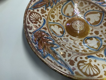 A very fresh large Hispano-Moresque lustre-glazed dish with ornamental design, Spain, 16th C.