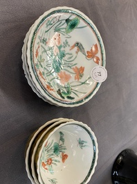 Three Chinese Kangxi-style caf&eacute;-au-lait-ground famille verte cups and saucers, rabbit mark, 19th C.