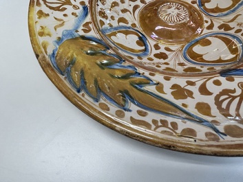 A very fresh large Hispano-Moresque lustre-glazed dish with ornamental design, Spain, 16th C.