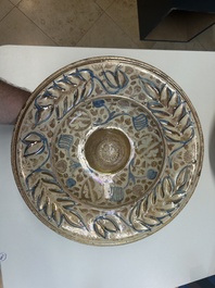 A large Hispano-Moresque lustre-glazed dish with ornamental design, Spain, 16th C.