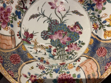 A Chinese famille rose plate with a deer near a lotus pond, Yongzheng