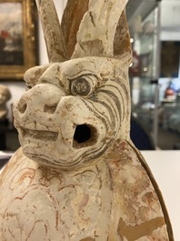 A Chinese painted pottery earth spirit, Tang