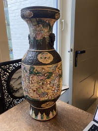 A Chinese Nanking famille rose vase with battle scenes, 19th C.