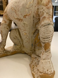 A Chinese painted pottery earth spirit, Tang