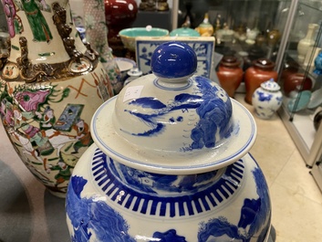 A pair of Chinese blue and white covered vases and a pair of Nanking famille rose vases, 19th C.