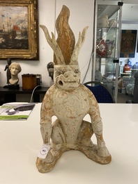 A Chinese painted pottery earth spirit, Tang