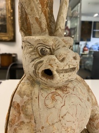 A Chinese painted pottery earth spirit, Tang