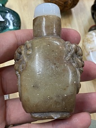 15 Chinese hardstone, glass and walnut snuff bottles, 19/20th C.
