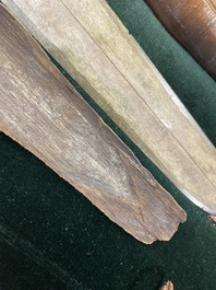 A Chinese bronze dagger with wooden scabbard in a display case, Han