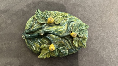 A polychrome Dutch Delft melon-shaped tureen on leaf-shaped stand, 18th C.