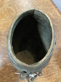 A Chinese archaic bronze ritual 'you' wine vessel and cover in Western Zhou-style, Ming