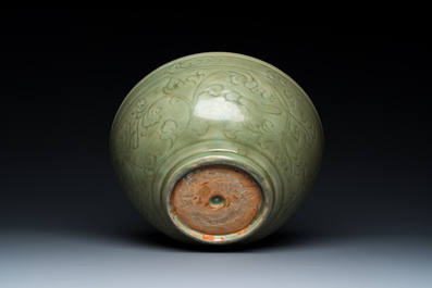 A large Chinese Longquan celadon bowl with underglaze design, Ming