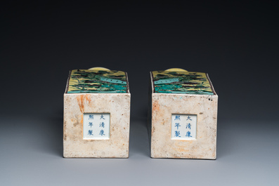 A pair of Chinese square yellow-ground famille verte vases, Kangxi mark, 19th C.