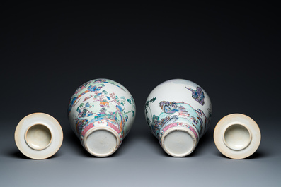 A pair of Chinese famille rose vases and covers with mountainous river landscapes, Yongzheng