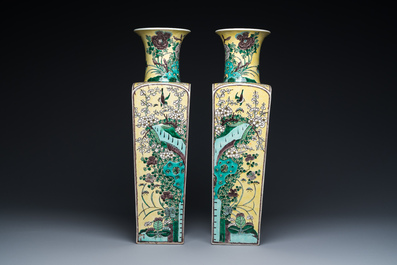 A pair of Chinese square yellow-ground famille verte vases, Kangxi mark, 19th C.