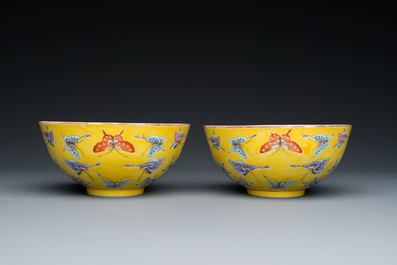 A pair of Chinese famille rose yellow-ground 'butterfly' bowls, Tongzhi mark and of the period