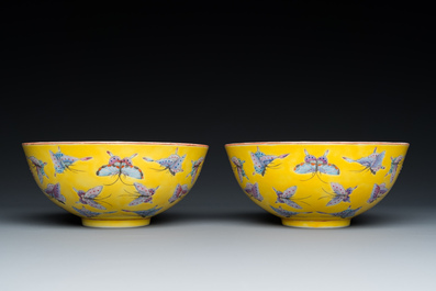 A pair of Chinese famille rose yellow-ground 'butterfly' bowls, Tongzhi mark and of the period