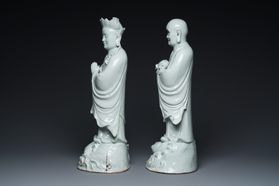 Two exceptionally tall Chinese white-glazed sculptures of Luohan, Qianlong/Jiaqing