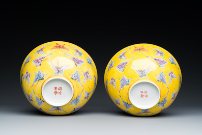 A pair of Chinese famille rose yellow-ground 'butterfly' bowls, Tongzhi mark and of the period