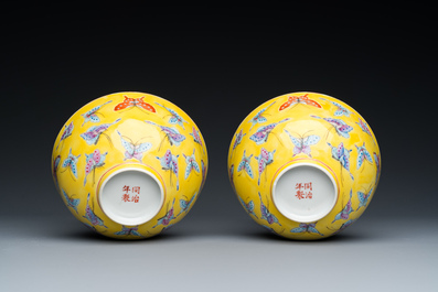 A pair of Chinese famille rose yellow-ground 'butterfly' bowls, Tongzhi mark and of the period