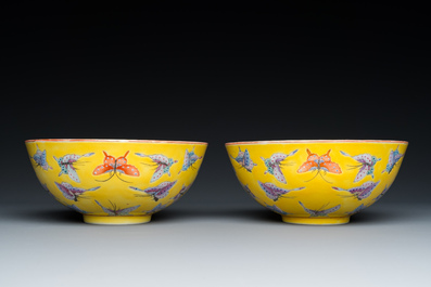 A pair of Chinese famille rose yellow-ground 'butterfly' bowls, Tongzhi mark and of the period